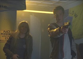 Logan (Jason Dohring) saves Veronica (Kristen Bell)