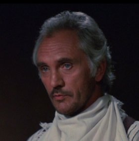 Terence Stamp as John Tunstall in Young Guns